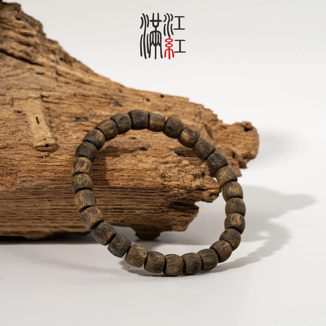 满江红 沉香手串/0.7随型鼓珠单圈/乌身圆叶/沉水/莺歌绿棋楠WD68
