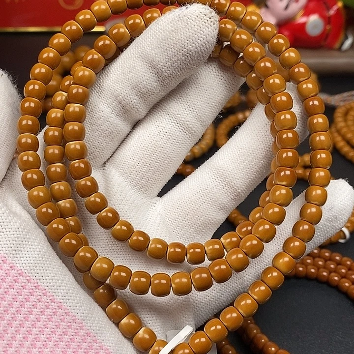 橄榄核手串6.7老挝正三花108加长（132颗）微微白