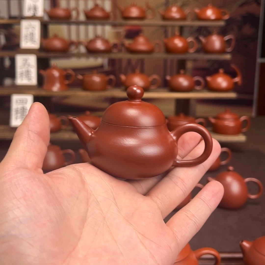 摄***行紫砂茶壶朱泥一杯梨