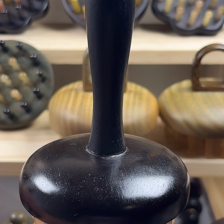 28齿羊角按摩梳紫光檀