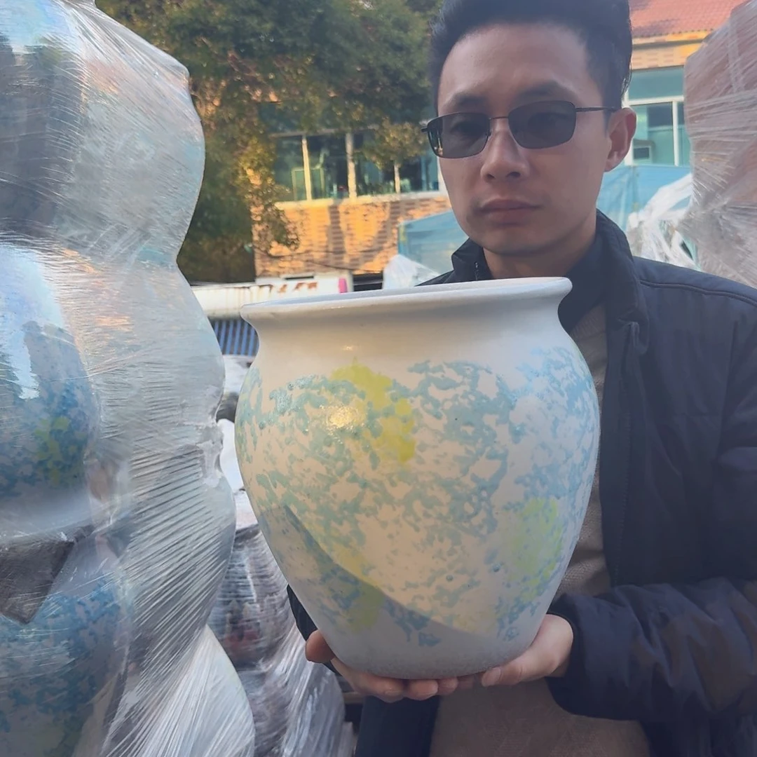 紫砂花盆口24.5高27（一个姹寂蓝色胖子