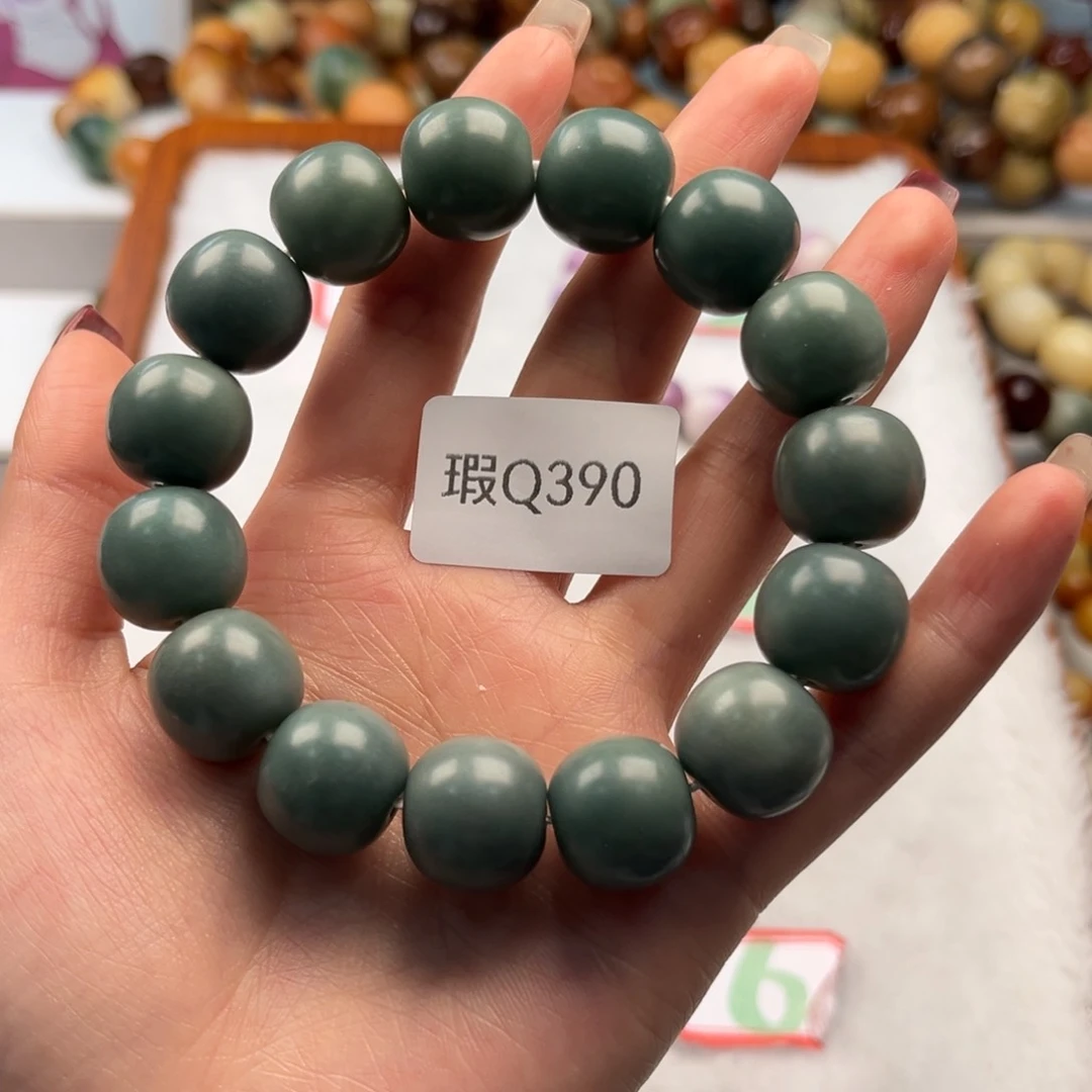 菩提根/象牙果手串梧*14+mm瑕苹果珠一串q390