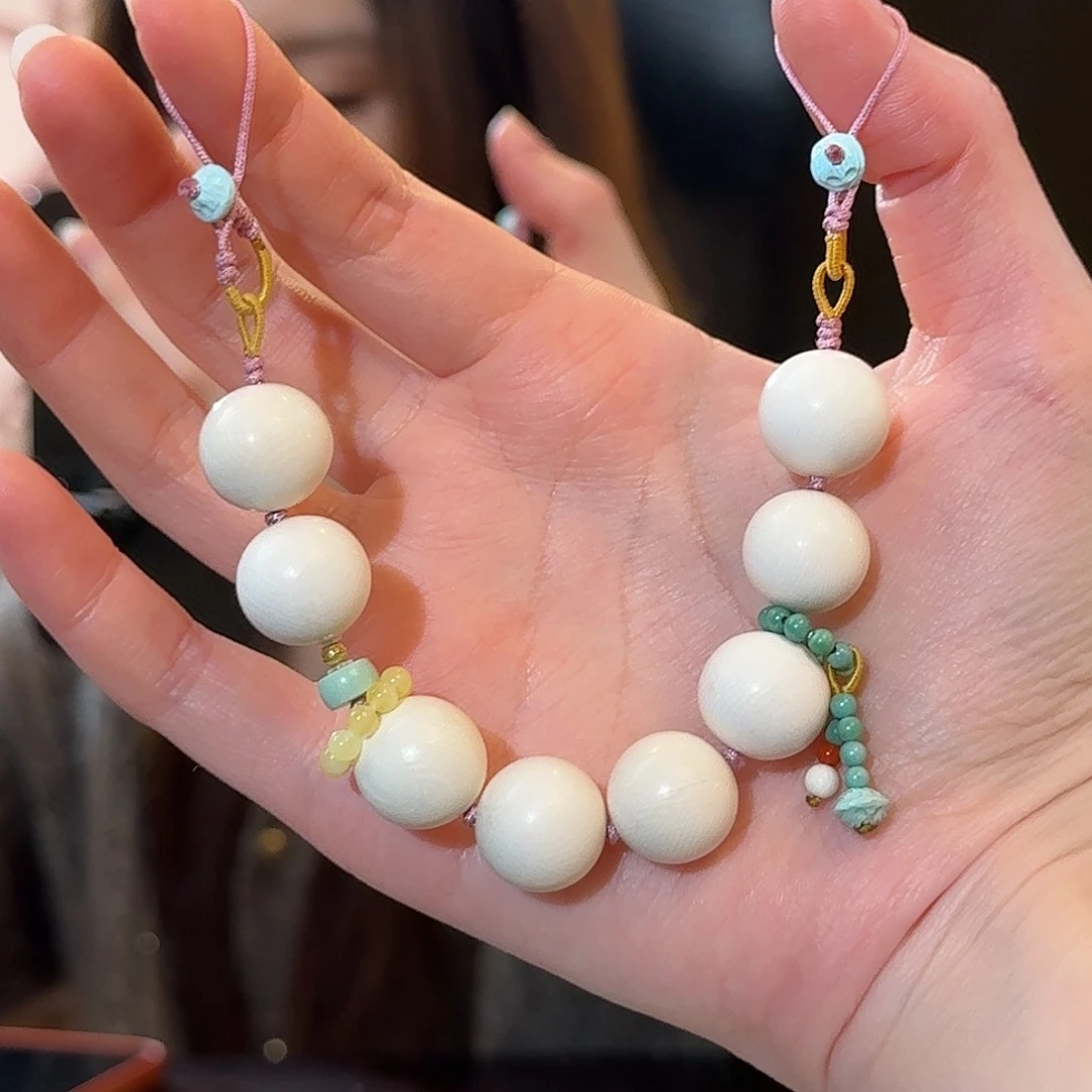 绿松石18K金镶嵌车挂双头牙牙手机链