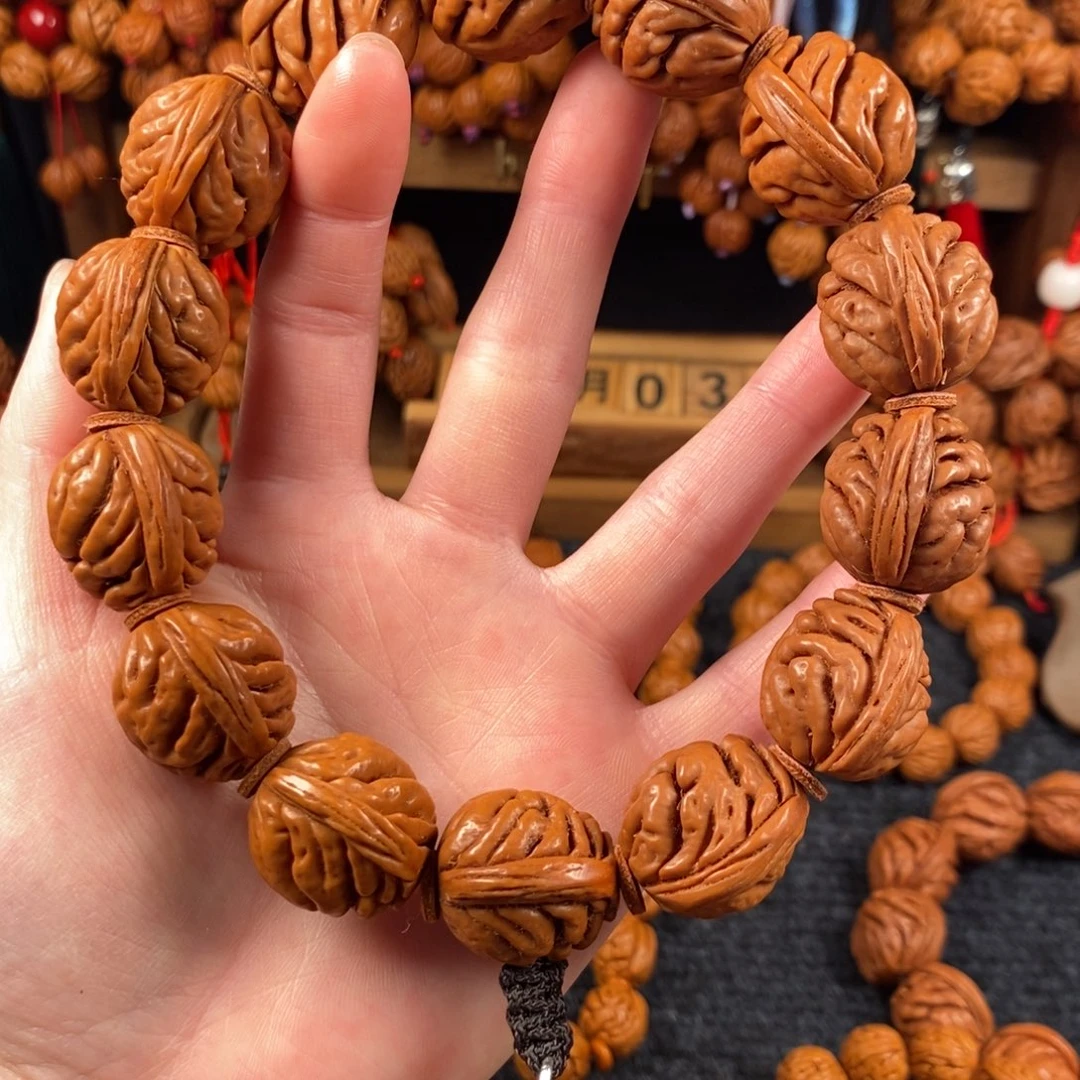 吊坠桃核桃枭手串