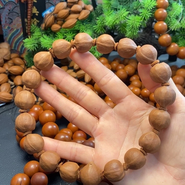 橄榄核手串1.7*1.9蜜桃臀