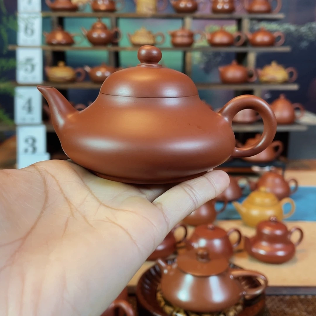 茶壶紫砂创****课潮州手工手拉朱泥扁梨壶
