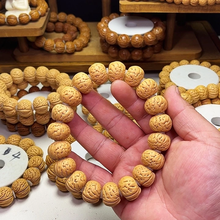 没***水桃核吊坠树王纽扣