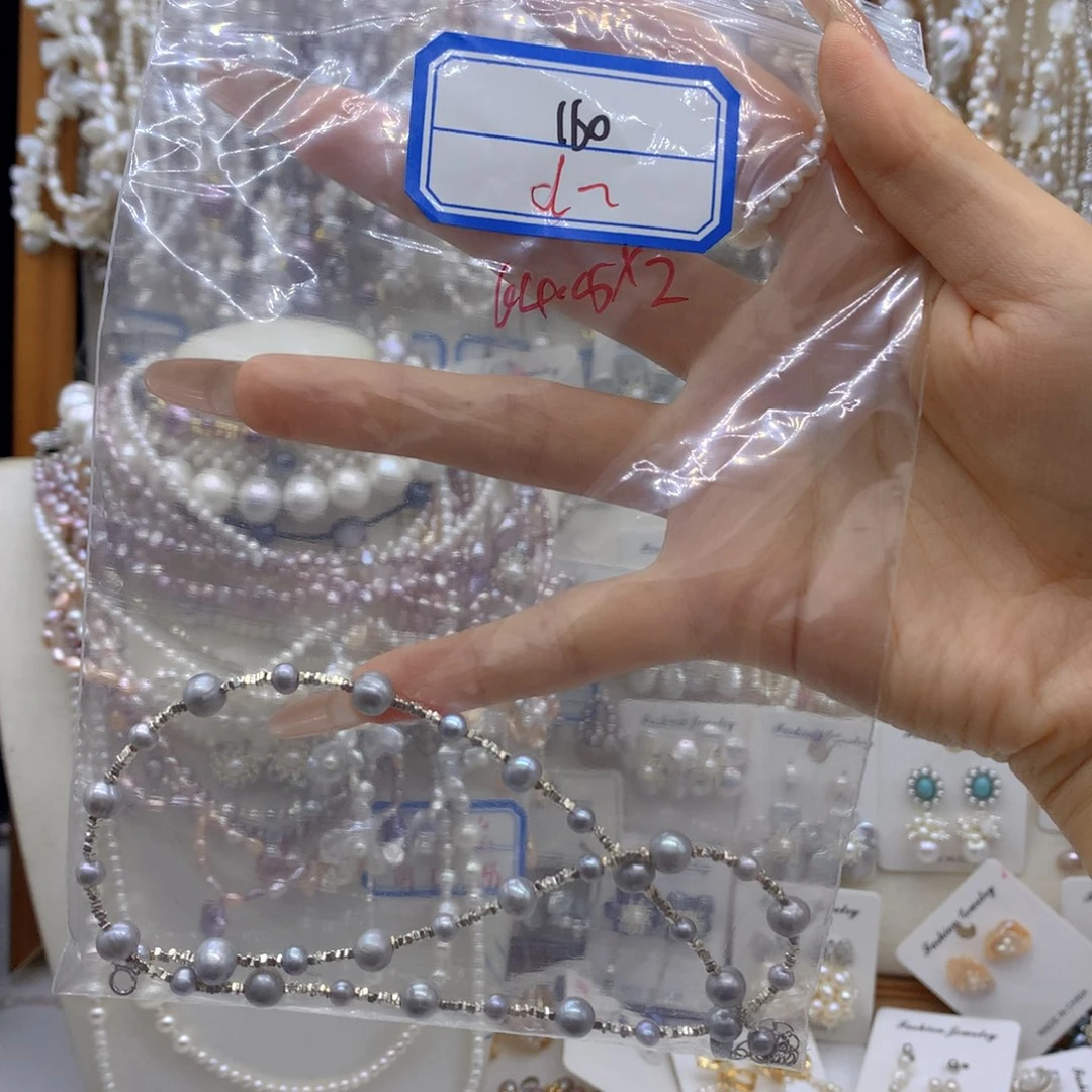 银S925镶嵌淡水珍珠耳饰d****g