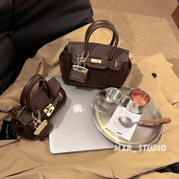 【黑巧可露丽】手提小包包女2025早秋新款通勤百搭斜挎包手提包包