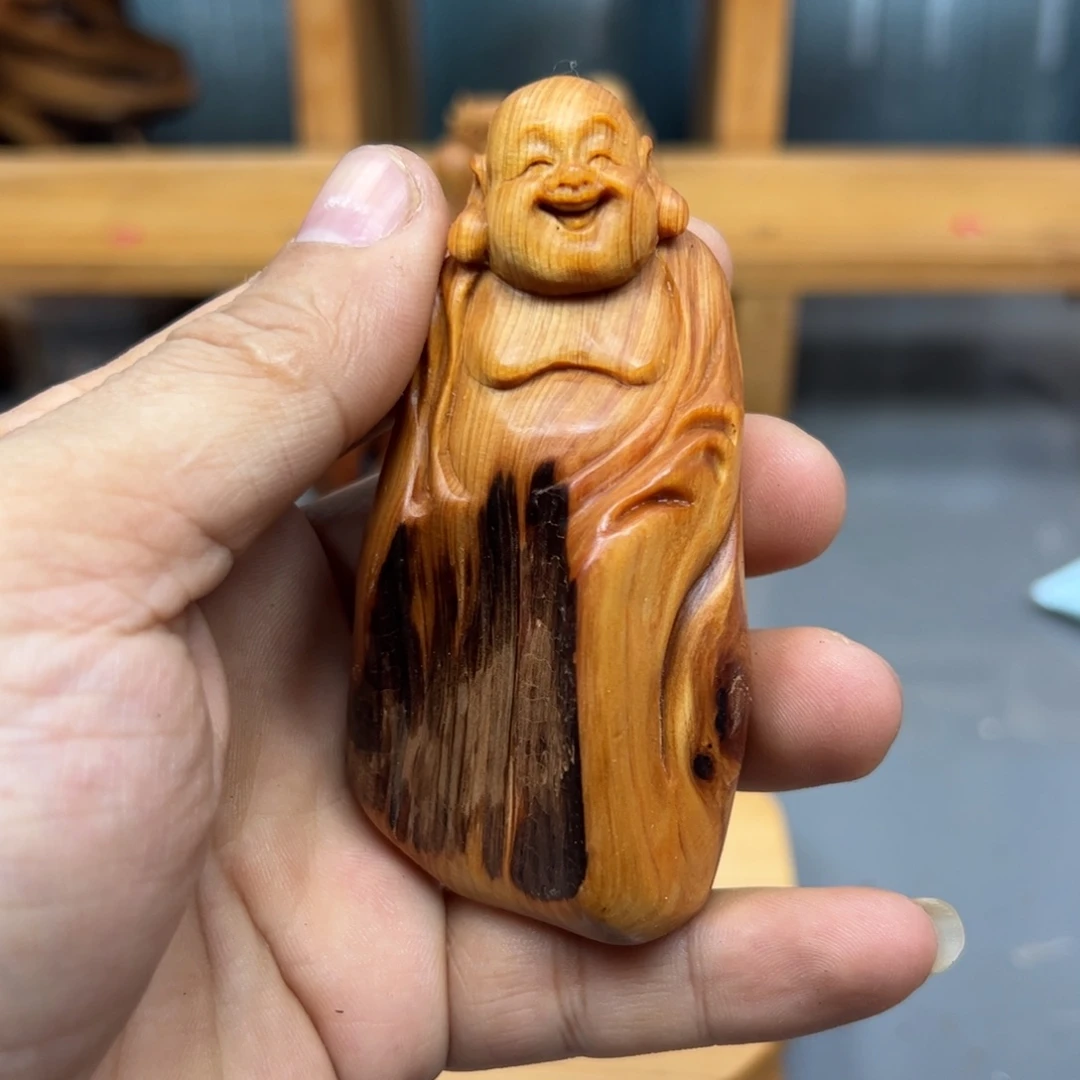 卢***目木崖柏木摆件手把件