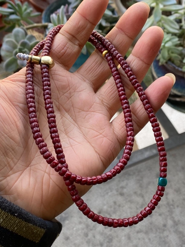 5mm精致玉化红百香籽药片顺纹长串带配饰220颗左右绕手腕三四圈