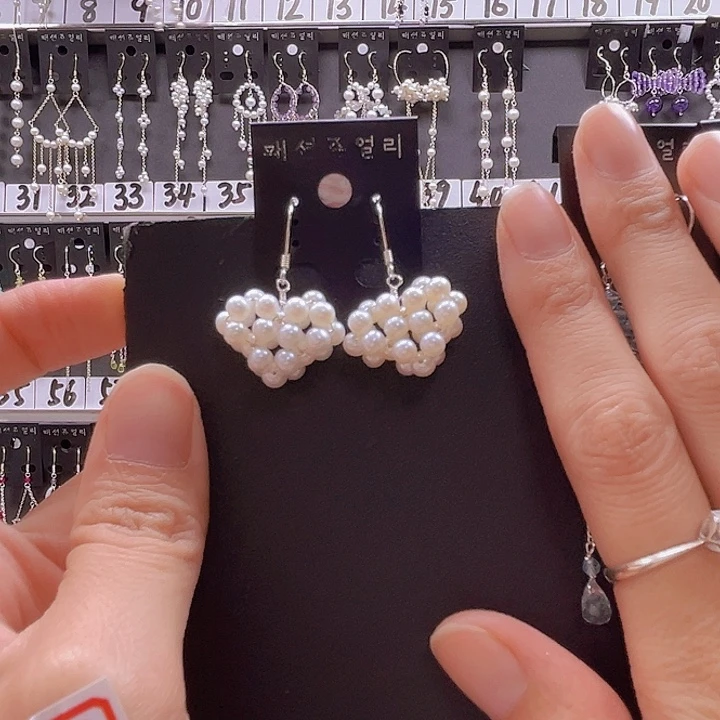 玥***児银S925镶嵌淡水珍珠耳饰