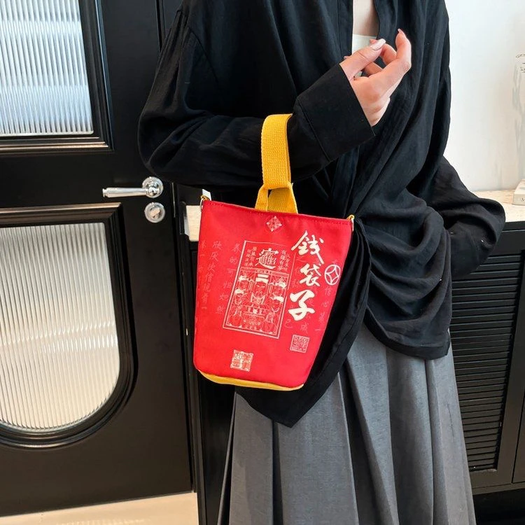 金蛇贺岁2025蛇年布袋钱袋子帆布包便携大容量斜挎包女手提遛弯包