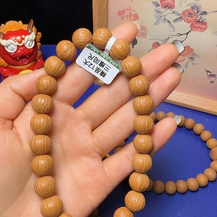 W***g猴头核桃手串聚宝盆