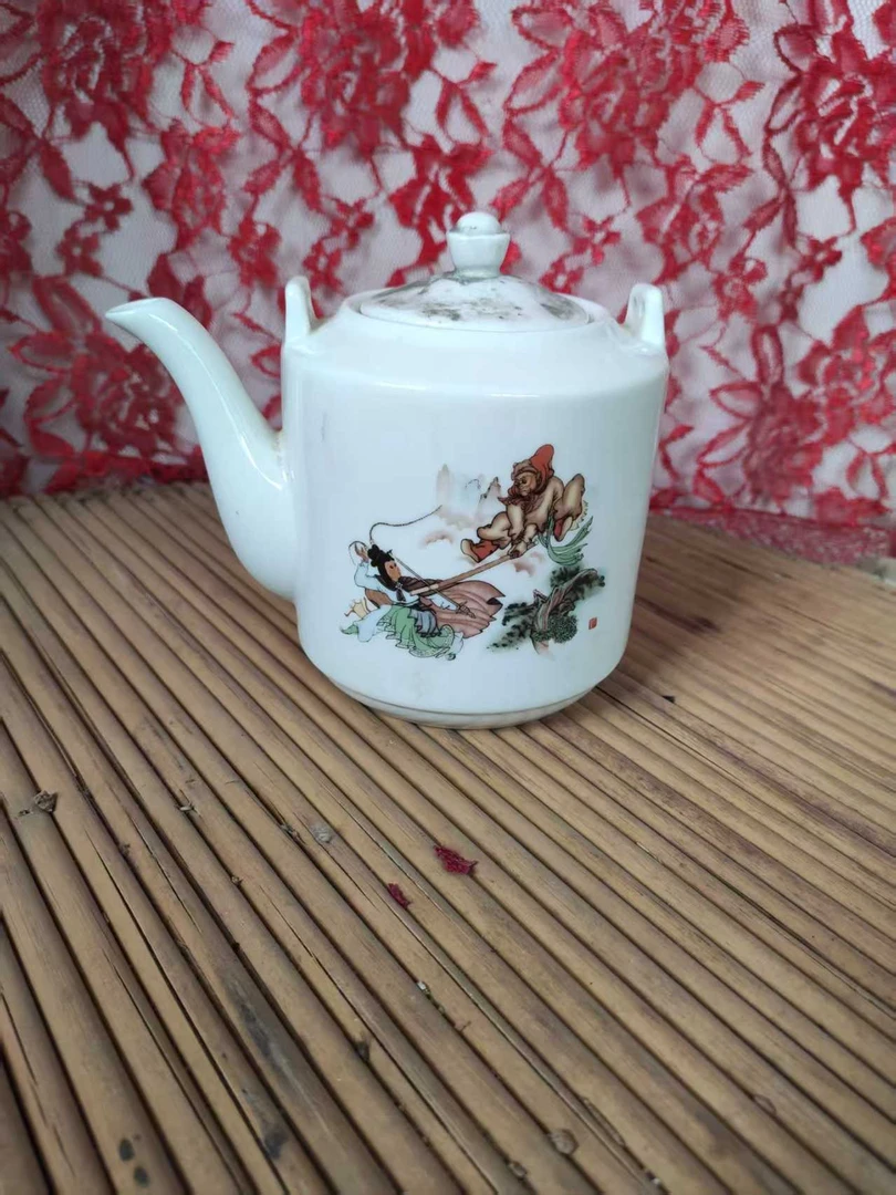 单孔微瑕三打白骨精提梁壶一个容量600毫升左右