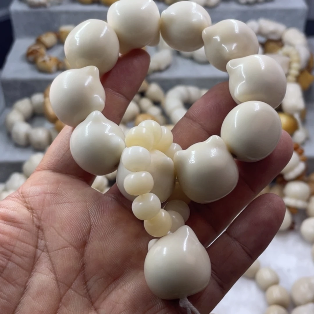 吊坠菩提根/象牙果全品象牙果猫头手串卡22