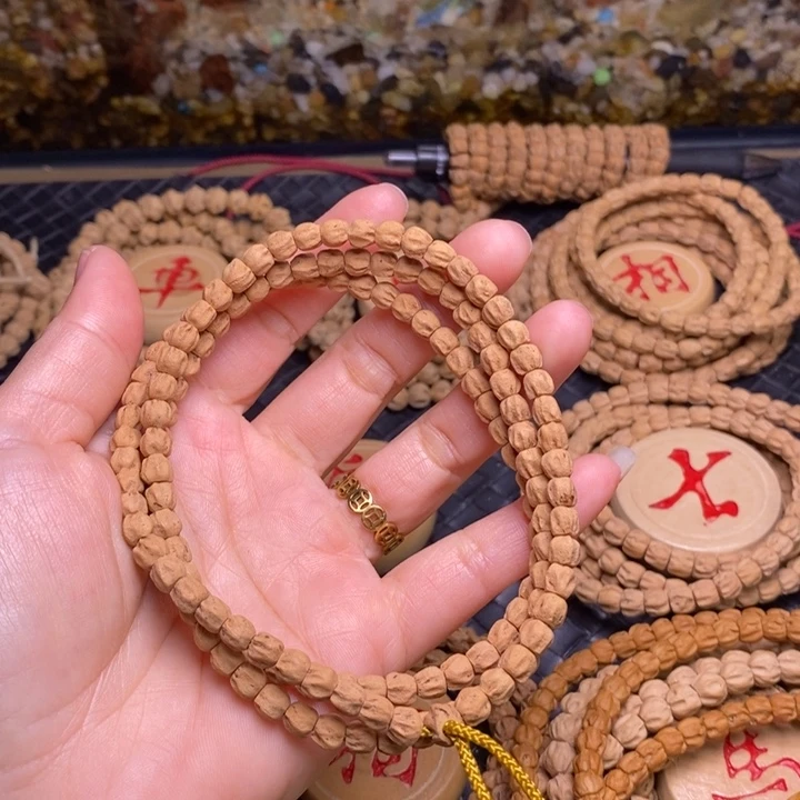 煌***启柏香籽/百香籽吊坠