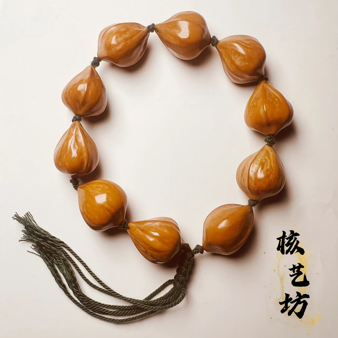 1.7-1.8小蒜头三花橄榄核素核手串-W