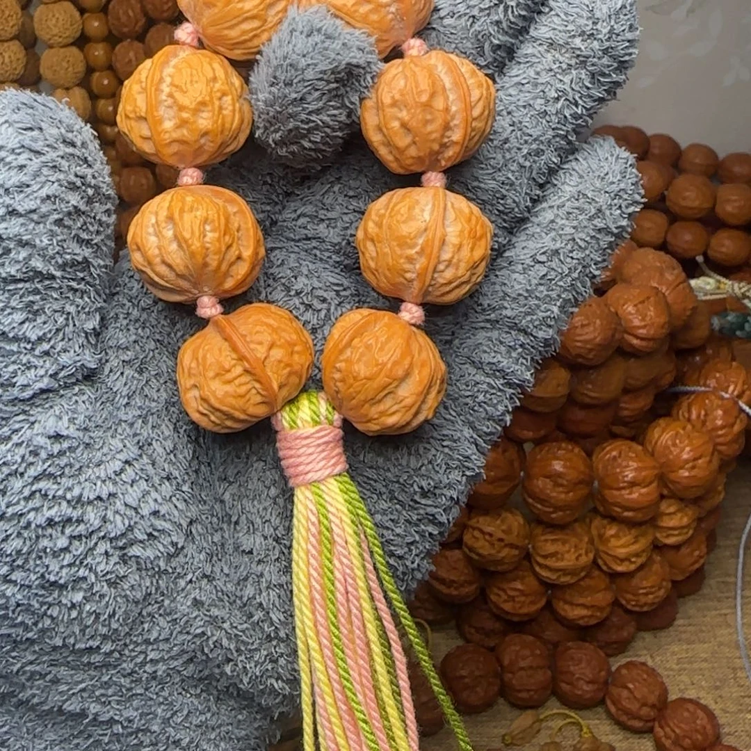 文玩核桃吊坠一到筋元宝手持白茶