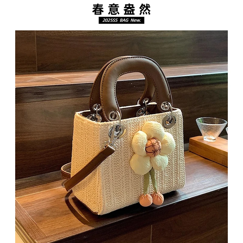 编织草编包包女2025新款小众设计高级感斜挎包海边爆款手提戴妃包