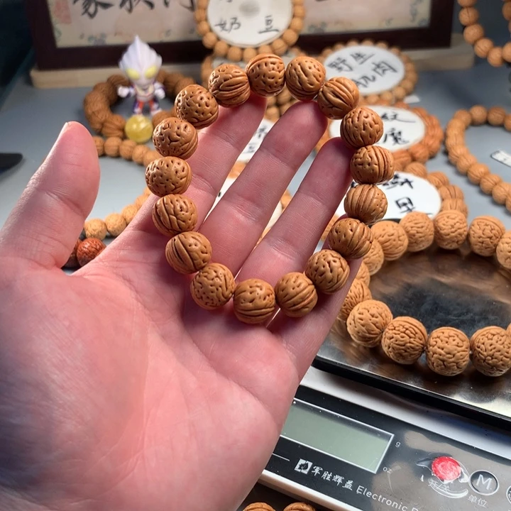 朱***少桃核吊坠肉纹红魔