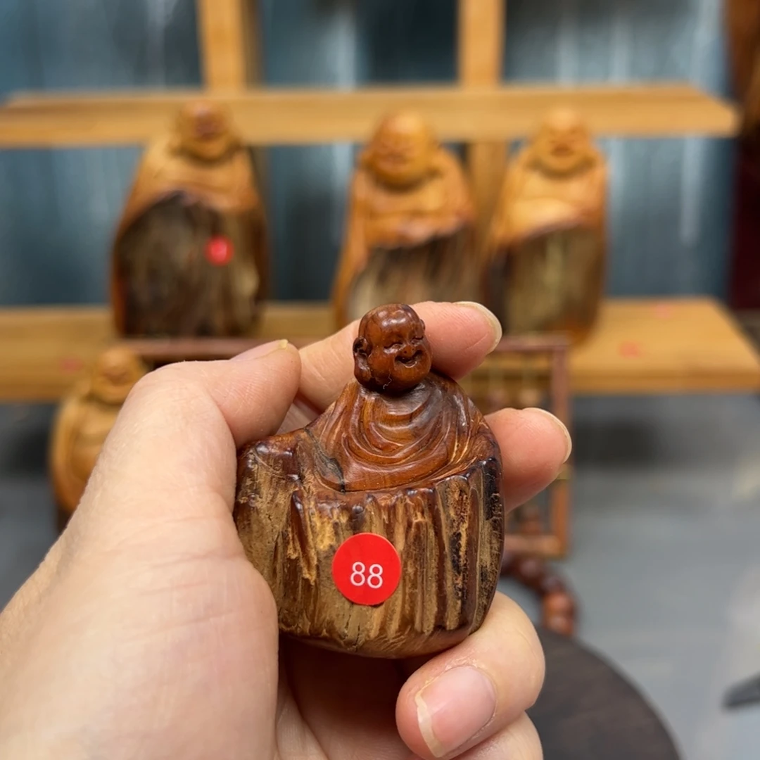 刘***洋木崖柏木摆件手把件，