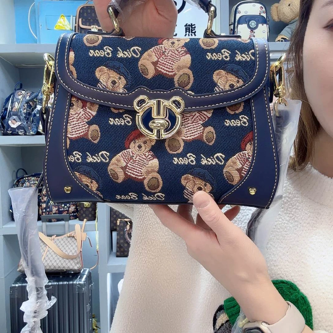 尼龙布18222彩条蓝单肩挎包