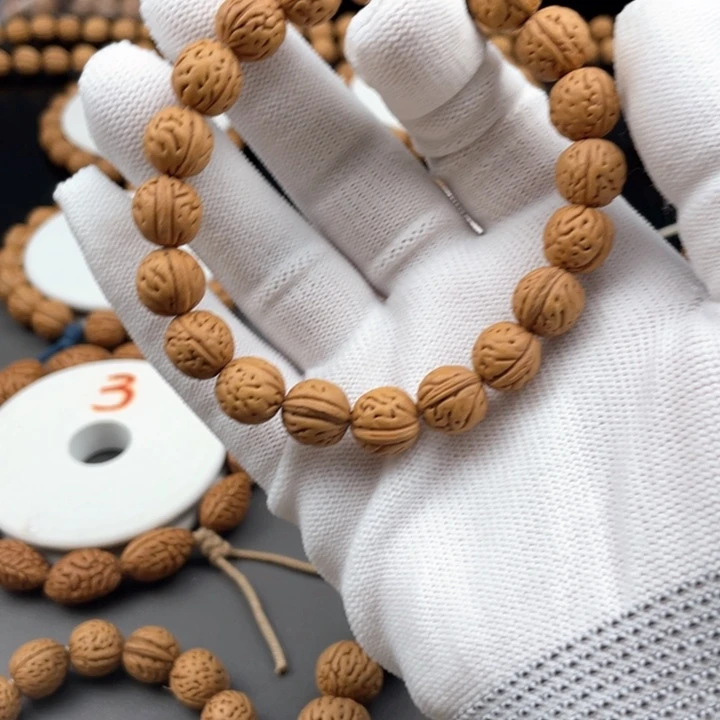 @*淡11.2尺寸野生桃核手串