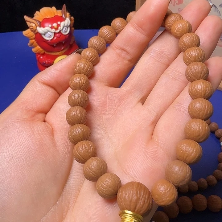 剑***香猴头核桃手串凤羽