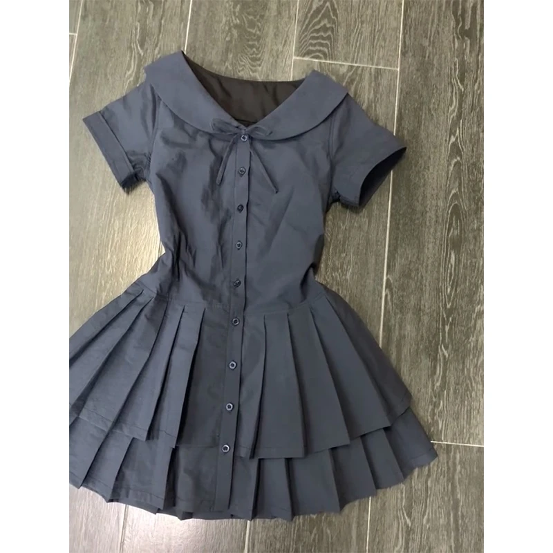 2025夏季新款藏蓝色连衣裙短袖蝴蝶结优雅气质拼接百褶A字裙短裙