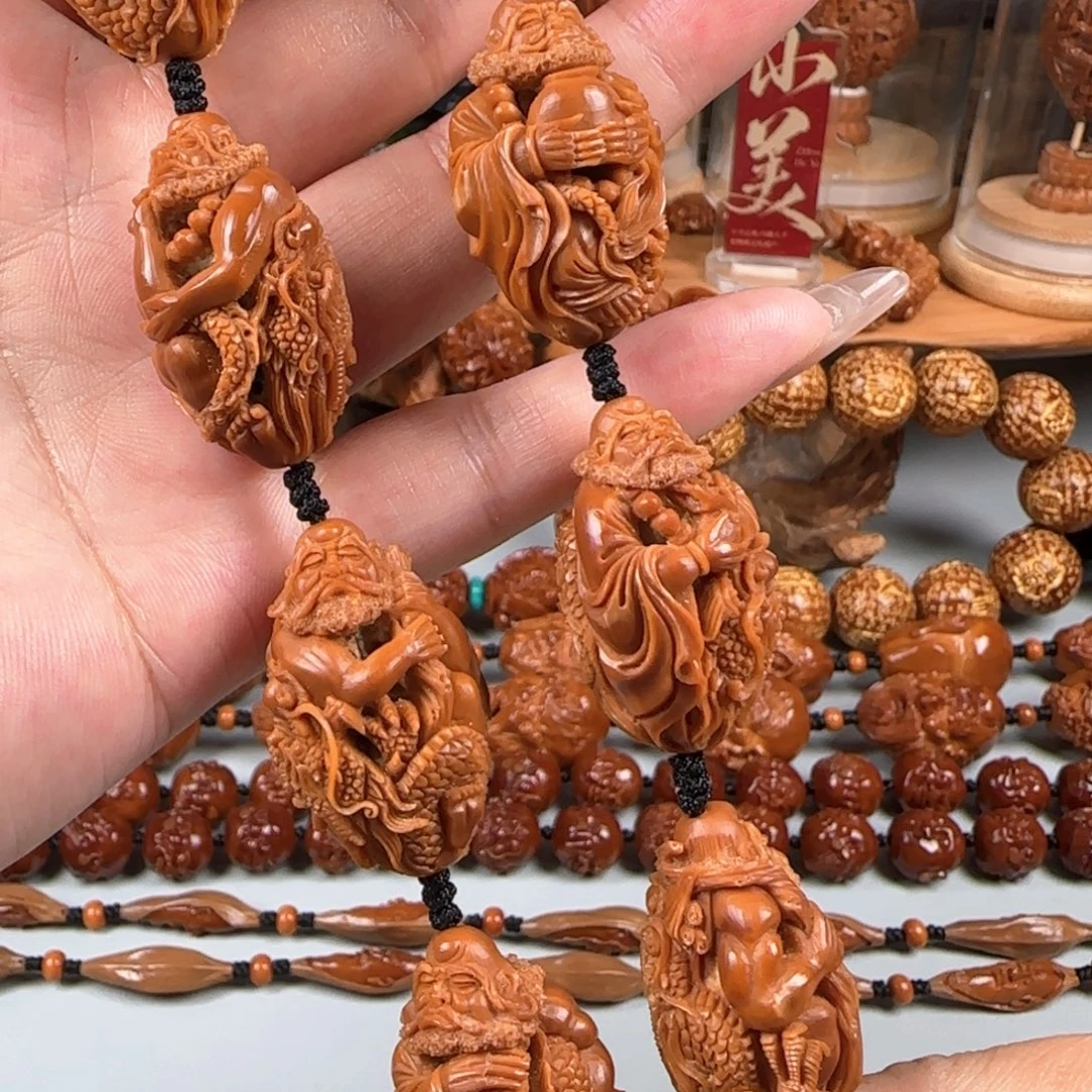 橄榄核手串/手链宽2.2鸡血红水晶核镂空御龙达摩手持
