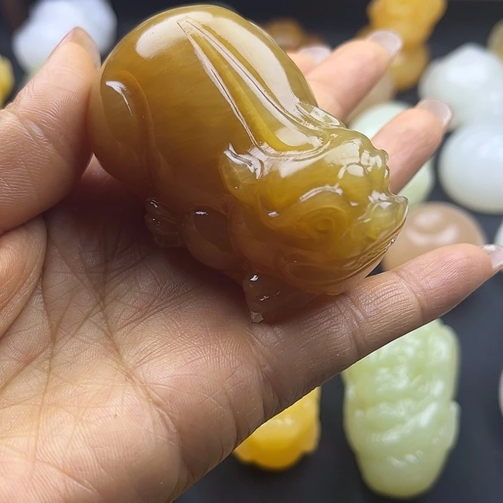 赵***生大理石磁石昆仑玉石手把件