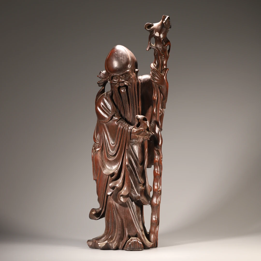 Lot01清代 龙眼木刻寿星公摆件