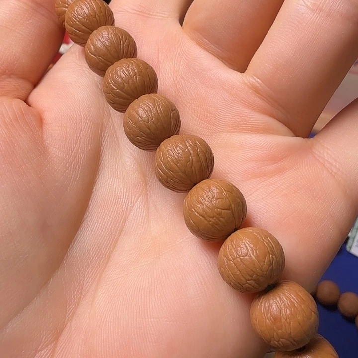 隔***王猴头核桃手串凤羽