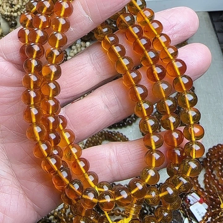 军***哥琥珀未镶嵌颈饰抚顺金珀8mm108