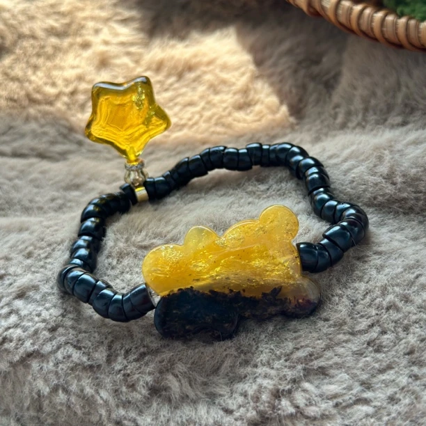 吉月蜜蜡洒金饼干熊星星椰蒂大肠手串