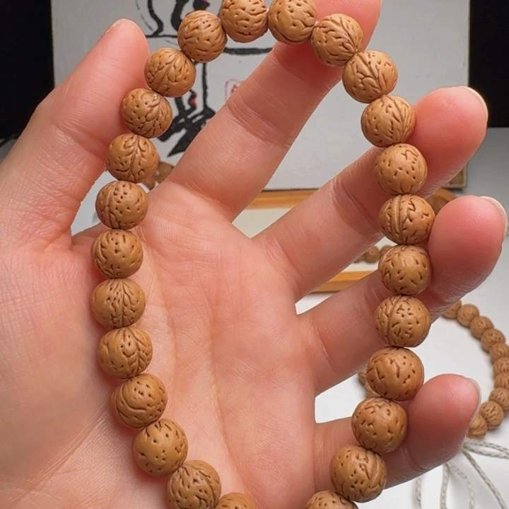 手串桃核10➕奶油皮小金豆