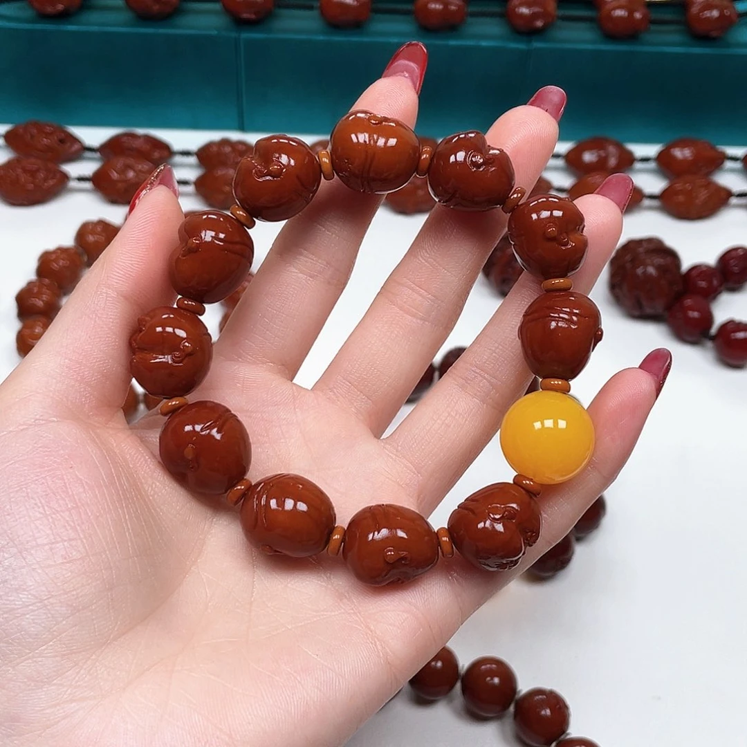 橄榄核手串@****哥百态，