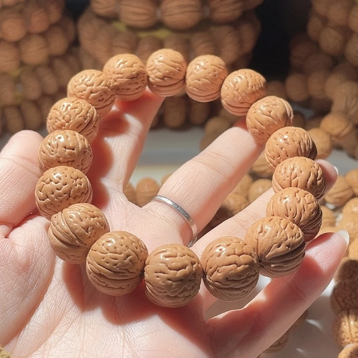 楚***航桃核吊坠桃核手串元宝60