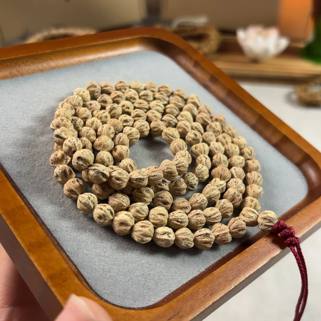 歸***網柏香籽/百香籽吊坠