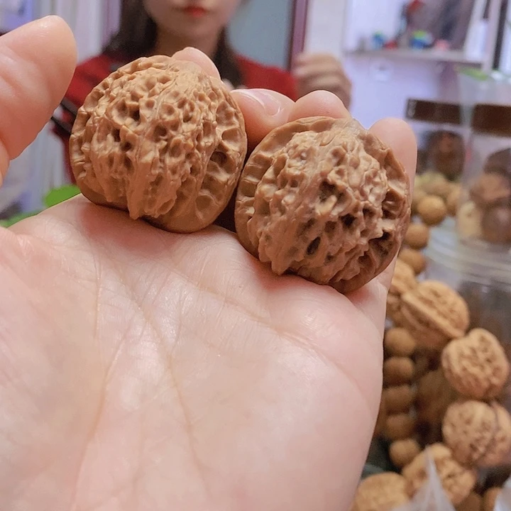 【闪购商品】文玩核桃把件35凤眼小众