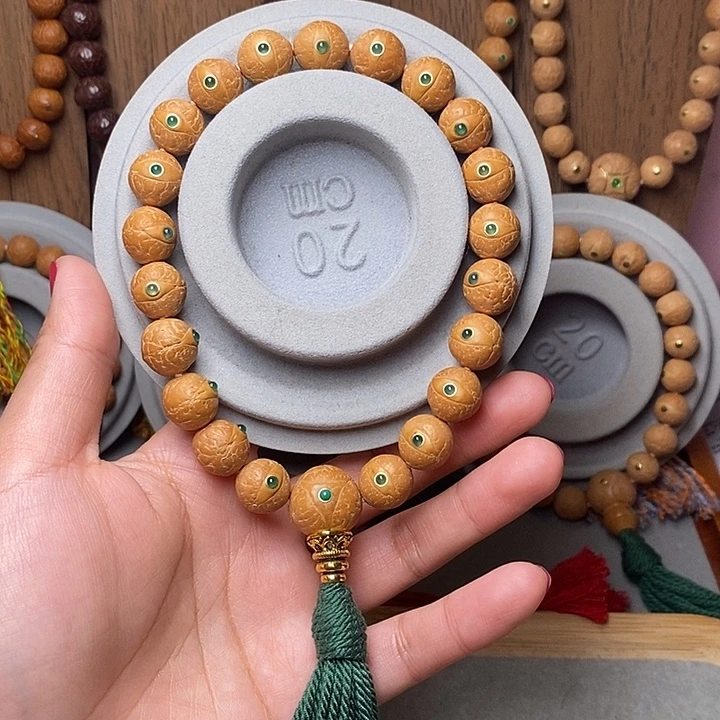 踏***梅手串凤眼菩提12mm➕绿宝石镶嵌