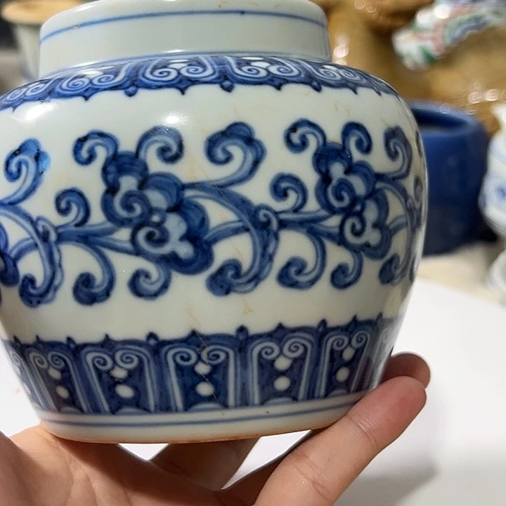 抱**生青花罐子一个