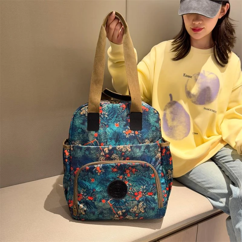 牛津布双肩背包女2025新款时尚轻便复古国风旅游帆布手提包托特包