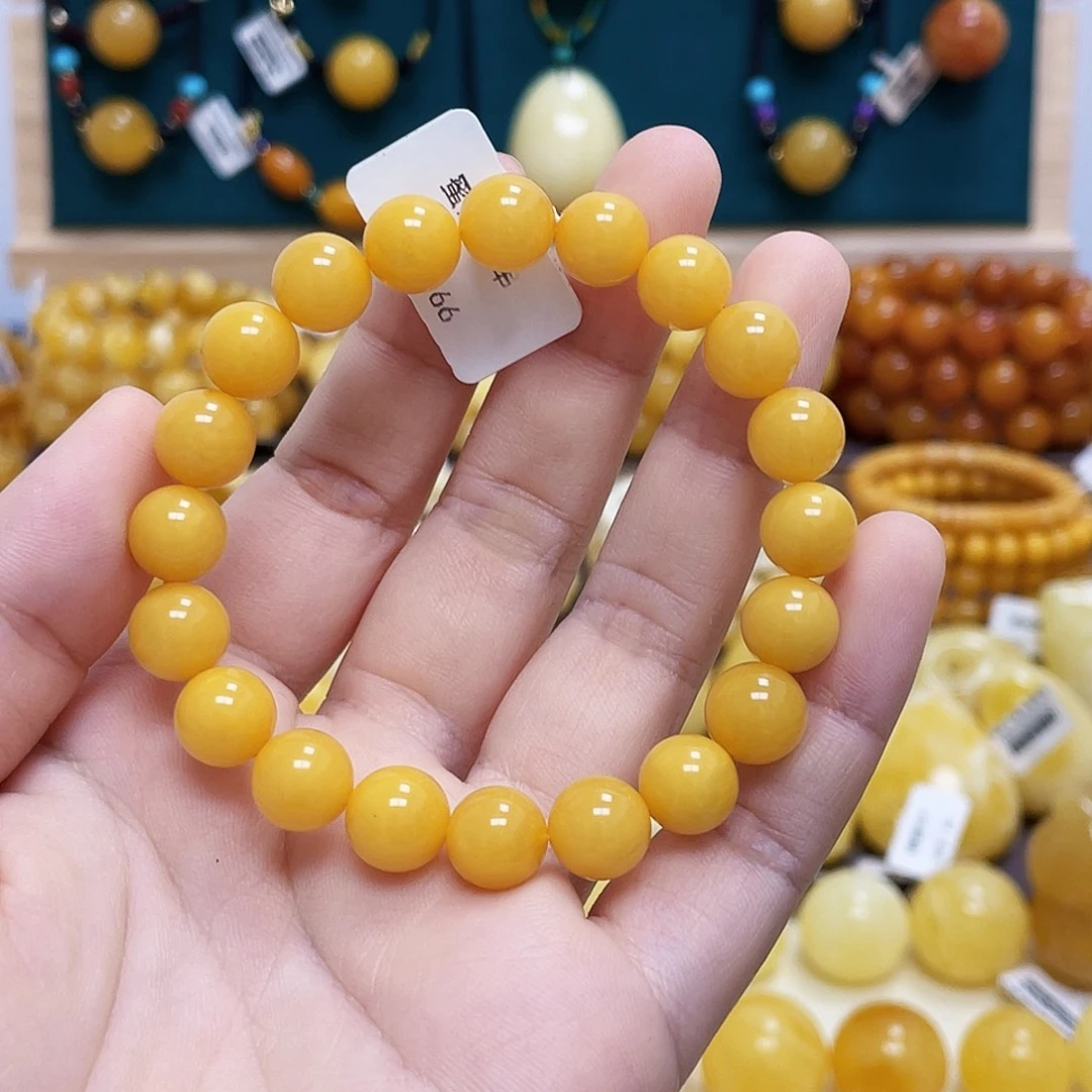 琥珀未镶嵌珠宝奇石橙*9+mm圆珠手串 瑕 福利