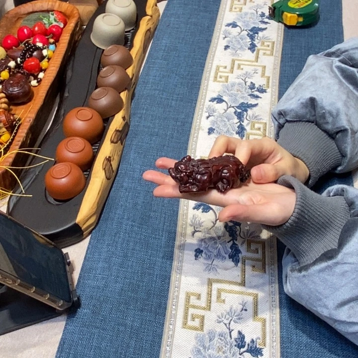 犀角紫檀貔貅把件