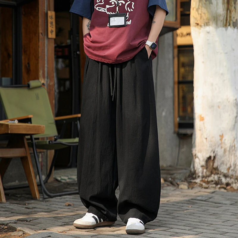 夏季纯棉透气薄款宽松弯刀裤男阔腿长裤子港风大码透气垂感休闲裤