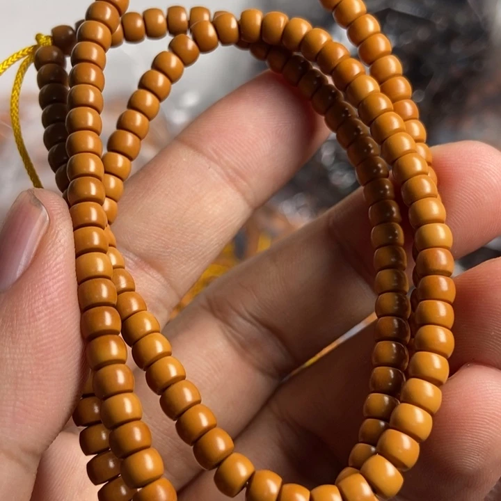 橄榄核吊坠在读大学之后