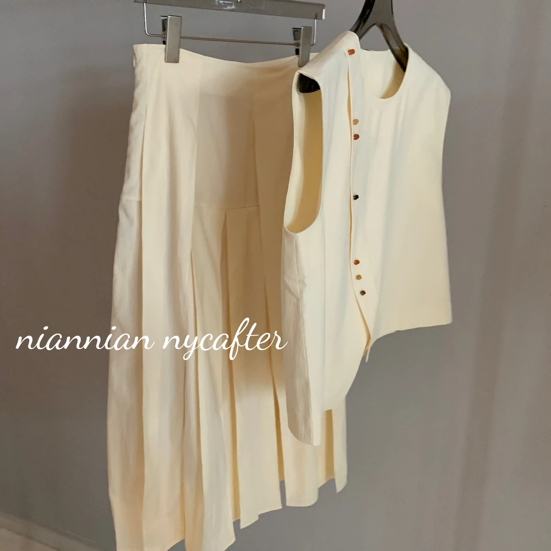 [春夏2025] 嫩黄白彩扣马甲半裙不规则马甲马面裙iu1928