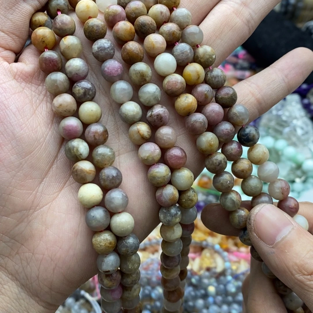 玛瑙/玉髓未镶嵌珠宝半成品一条天然8mm粉碧玺原石B395